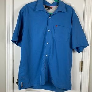 Quicksilver blue short sleeved button down shirt size medium. 70% rayon, 30% pol